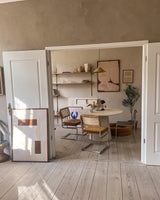 Curated poster wall with a minimalist look