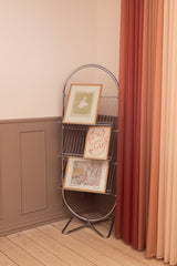 Warm and colorful art posters on magazine rack