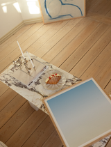 Blue art posters in living room