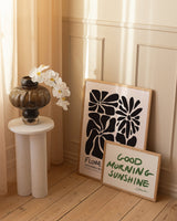 Graphic art posters leaning against the wall