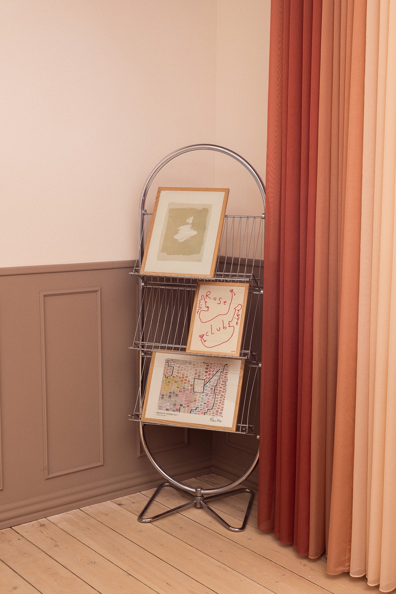 Warm and colorful art posters on magazine rack