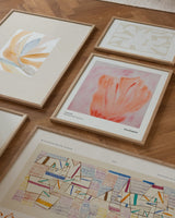 Colorful arrangement of art posters on the floor